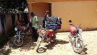 Quick bodaboda transfer of stuff in Entebbe, Uganda