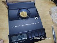 2020-03-28, 5.924 grams of natural gold nuggets on the balance scale