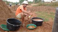 Dish wash to settle finest gold particles down from the surface of water