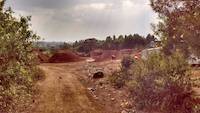 Tailings in background