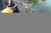Testing the INGCO water pump in Kampala, Uganda, directly on the beach of Lake Victoria