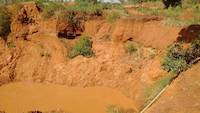 Layers of rocks visible in the open pit