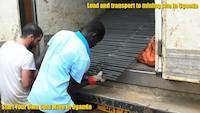 Heavy grizzly bars loaded into the truck before departure to the alluvial gold mining site in Uganda