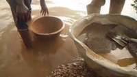 Recovering gold from concentrate after washing the ores in the sluice, Ghana