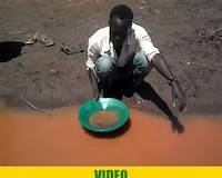 Mr. Okedi, gold panning in Amonikakinei, Uganda