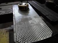 Perforated metal screen used in SYOGM Rock Impact Mills