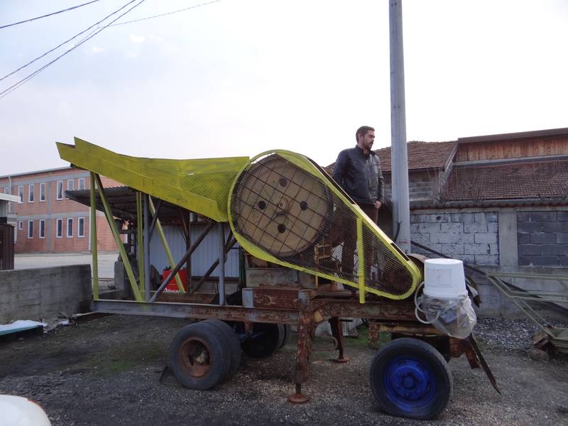 Mr. Louis standing on the jaw crusher