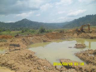 The soagum gold washing plant and excavator on the mining site in Ghana