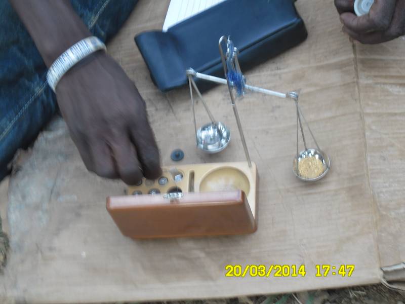 Gold broker purchasing gold directly on the mining site in Ghana