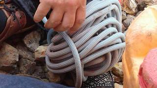 Preparing ropes to descend into the mining shaft