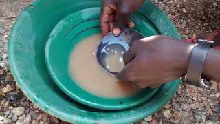 Checking gold in rocks