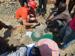 Prospecting for gold in mother lode rocks