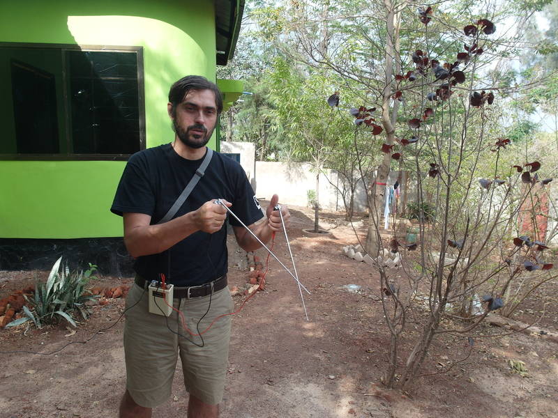 Mr. Jean Louis with the modern dowsing rods in the hands