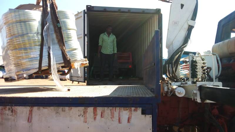 Offloading goods from a container