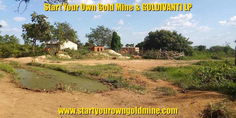 Artisanal mining site and pond of water