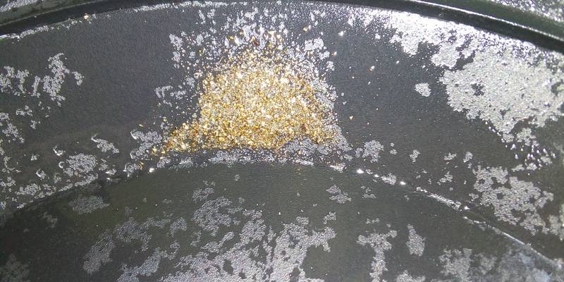 The fine gold in the gold pan, Geita, Tanzania