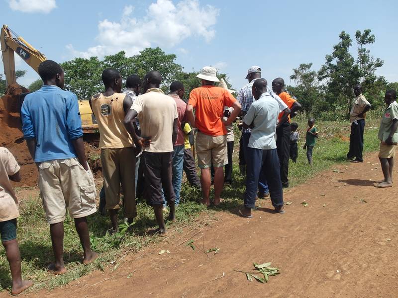 Talking with local farmers and miners