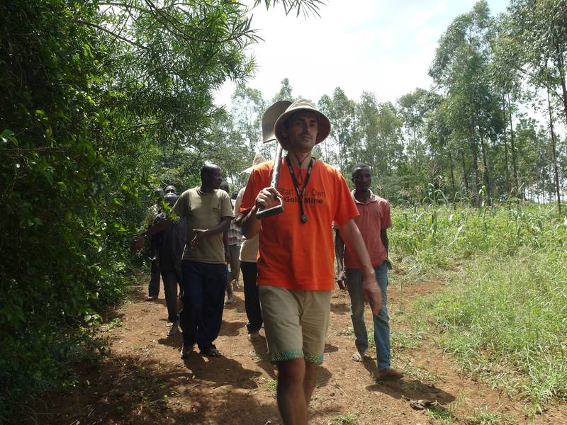 Mr. Louis leading people to the river