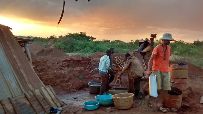 Team of people processing tailing heaps