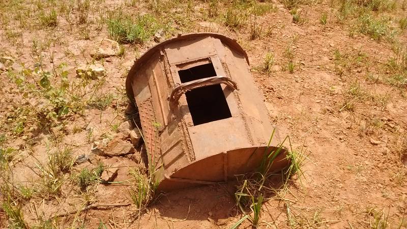 The old abandoned rudimentary ball mill drum