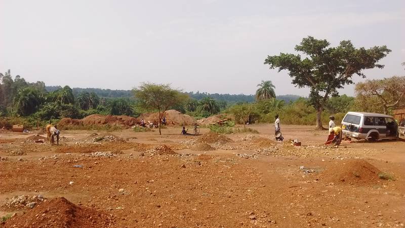 Tailings heaps in background on mineral processing site