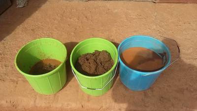 Sampling buckets contain gold concentrates