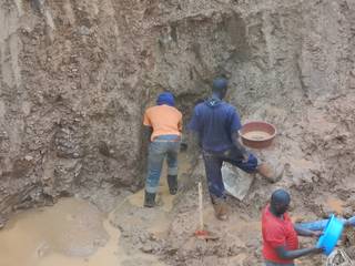 Miners in Uganda trying to get to the rich ore vein