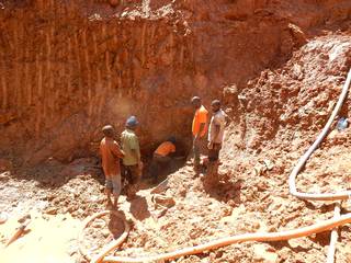 Miners at ore in sight