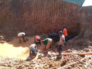 Miners panning for gold in Uganda