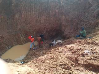 Scenes from gold panning in open pit